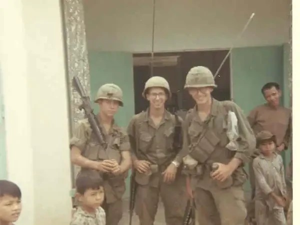Soldiers on light patrol in a village