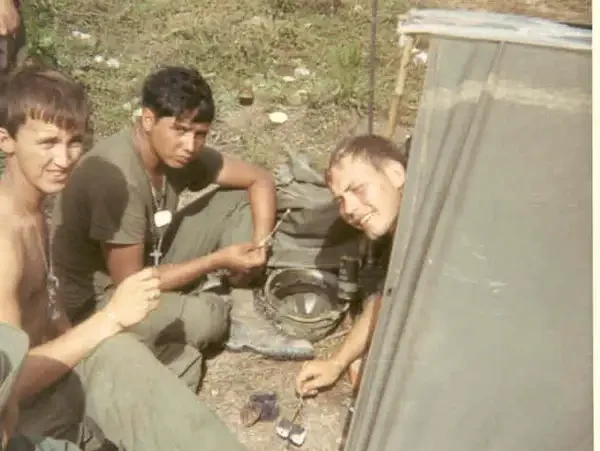 Ray, Doc, and LT Holroyd toasting marshmallows with blue tablets